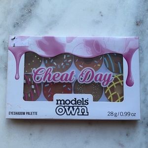 Models own Cheat Day eyeshadow palette